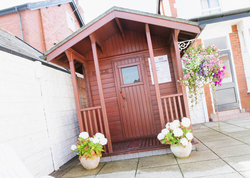 The sauna cabin beside the outdoor pool at the Doric Hotel